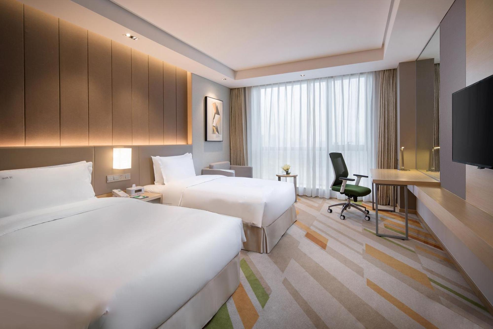 Holiday Inn Wuxi Taihu New City By Ihg Buitenkant foto